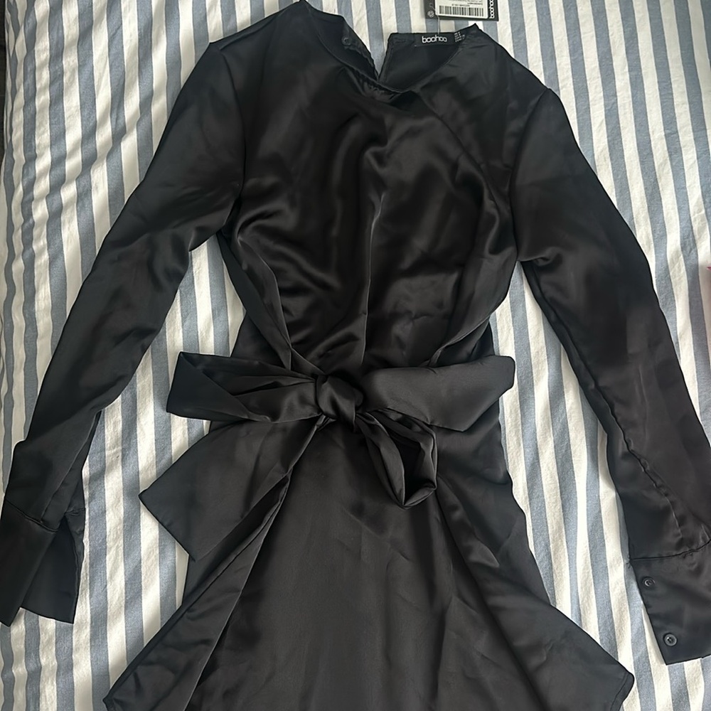 Never worn beautiful long sleeve black silky dress! bow/tie front! From BOOHOO